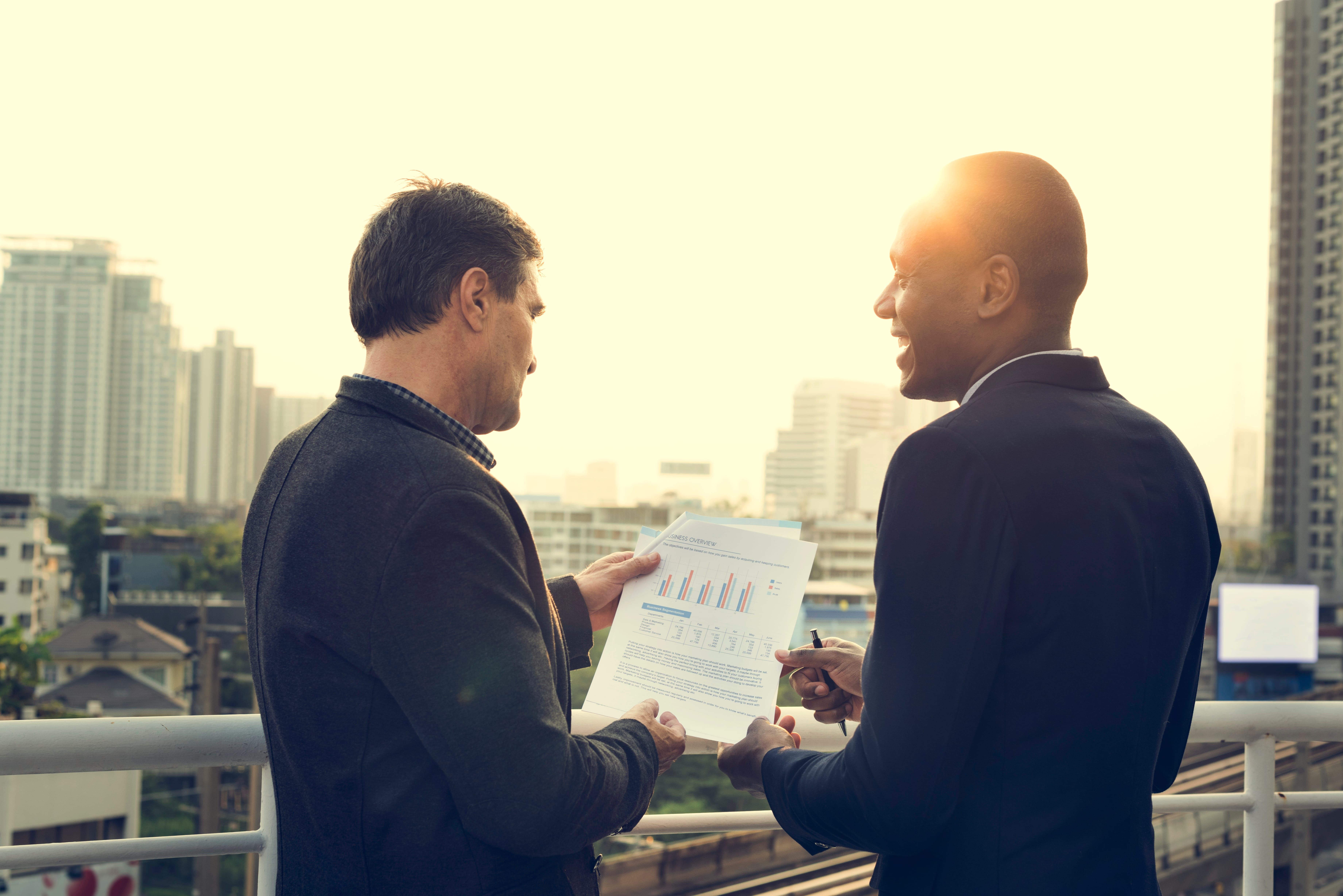Business professionals discussing financial strategies